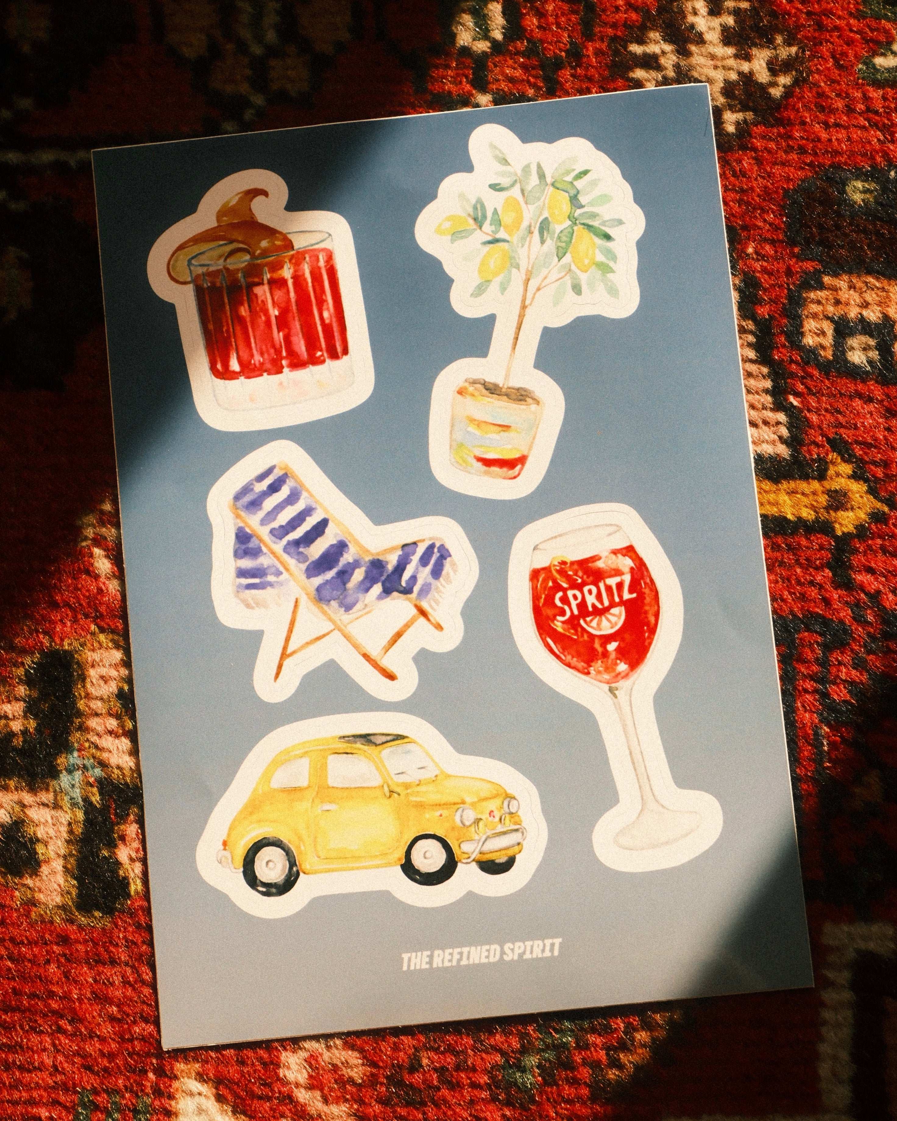 Set of illustrated stickers on a card with a colorful patterned background